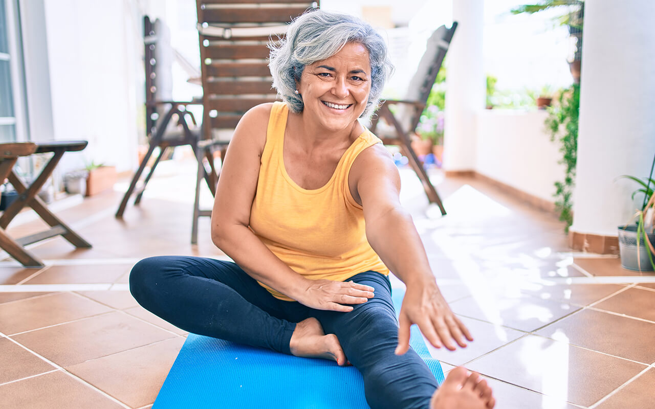 Older woman doing yoga