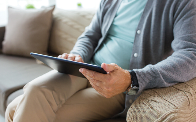 Person holding tablet