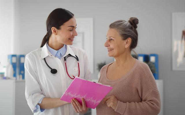 A woman speaking with her healthcare provider