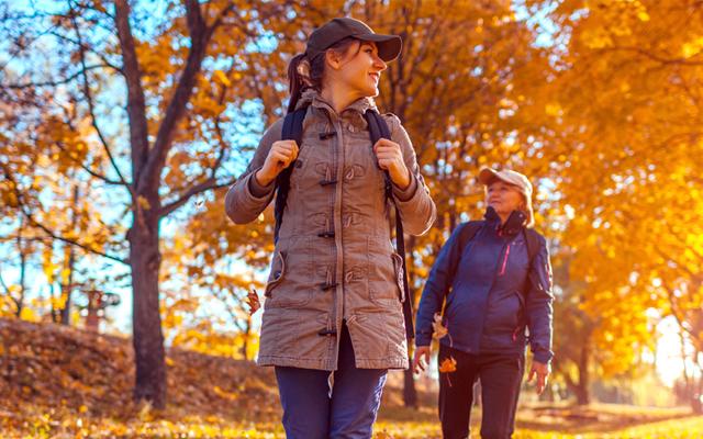 Two women walking outside