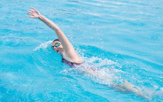 Woman swimming in a pool